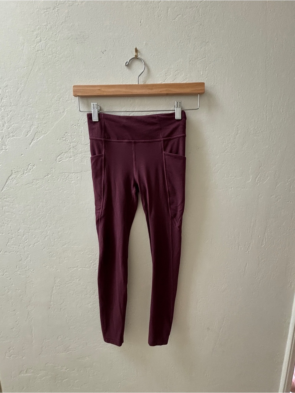 Athleta Girls Stash Leggings in Deep Burgundy with Side Pockets